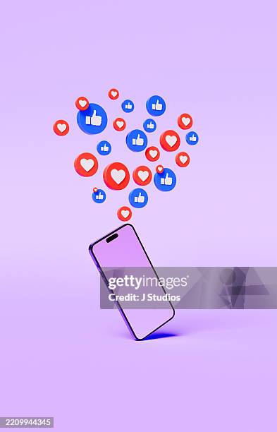 social media like and heart buttons floating above smartphone – digital engagement and mobile interaction - sociale kwesties stockfoto's en -beelden