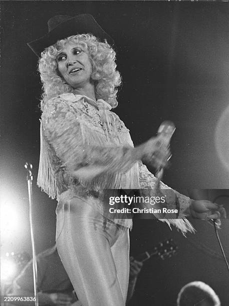 Tammy Wynette , American singer-songwriter, during a concert, April 1981.