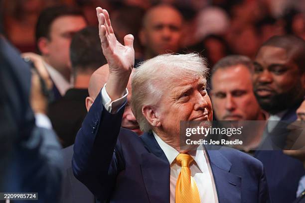 President Donald Trump prepares to watch the Ultimate Fighting Championship at the Kaseya Center on April 12, 2025 in Miami, Florida. The Trump...