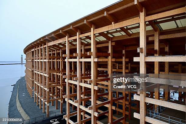 People visit the Grand Roof , the symbol of the venue, during the opening day of the World Expo 2025 Osaka at Yumeshima on April 13, 2025 in Osaka,...