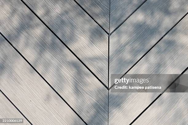 a wooden board with a slanted line on it - crooked tree stock pictures, royalty-free photos & images