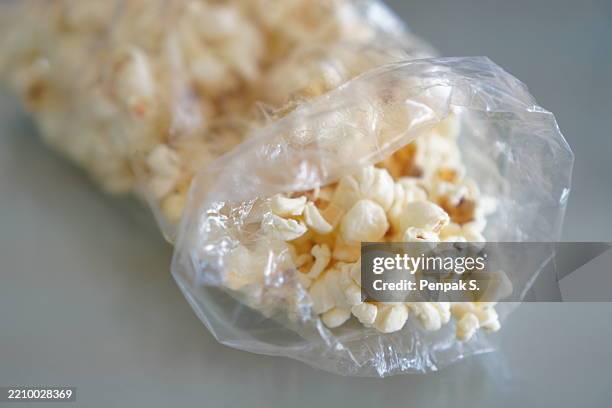 Popcorn In Plastic Packet 50 Plastic Bag Of Popcorn Stock Photos, High-Res Pictures, and Images ...