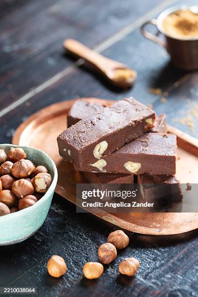 chocolate hazelnut fudge squares - fudge stock pictures, royalty-free photos & images