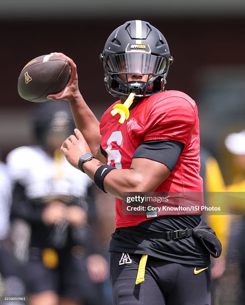 Spring App State Matthew Wilson of the Appalachian State Mountaineers throws passes at ...