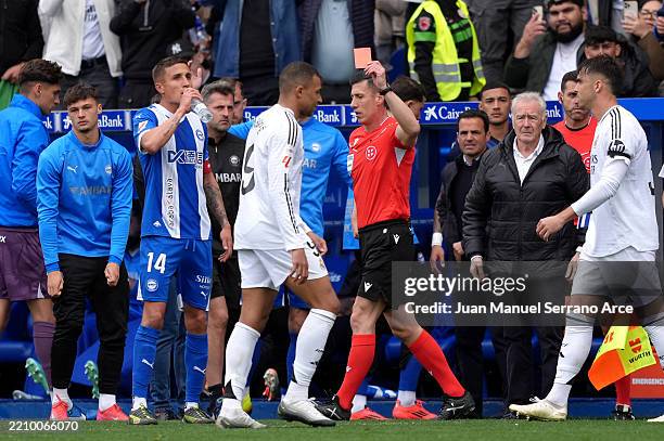 Kylian Mbappe of Real Madrid is shown a red card by referee Cesar Soto Grado during the LaLiga match between Deportivo Alaves and Real Madrid CF at...