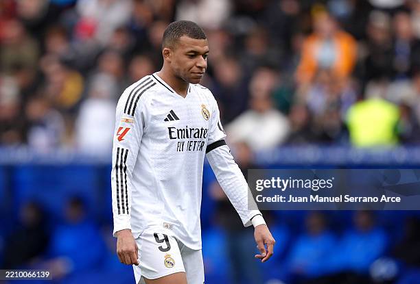 Kylian Mbappe of Real Madrid leaves the pitch after receiving a red card during the LaLiga match between Deportivo Alaves and Real Madrid CF at...