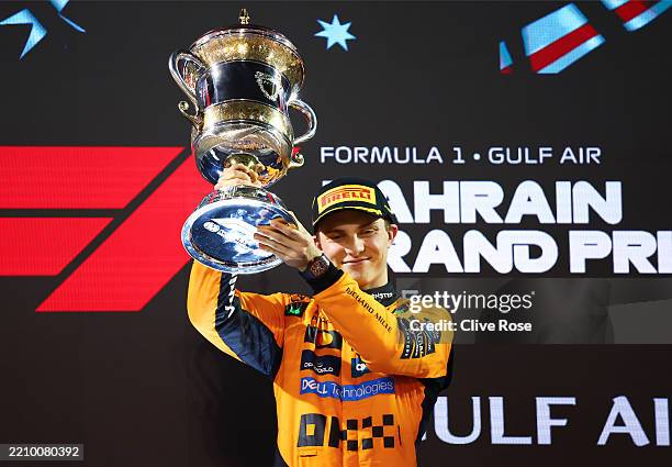 Race winner Oscar Piastri of Australia and McLaren celebrates on the podium during the F1 Grand Prix of Bahrain at Bahrain International Circuit on...