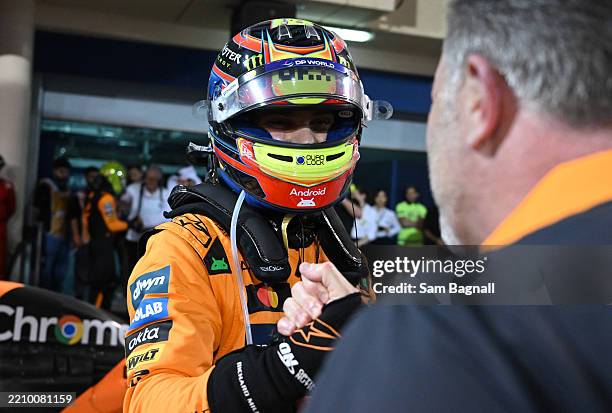 Race winner Oscar Piastri of Australia and McLaren celebrates in parc ferme with Zak Brown, Chief Executive Officer of McLaren during the F1 Grand...