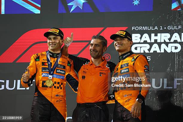 Race winner Oscar Piastri of Australia and McLaren Andrea Stella, Team Principal of McLaren and Third placed Lando Norris of Great Britain and...