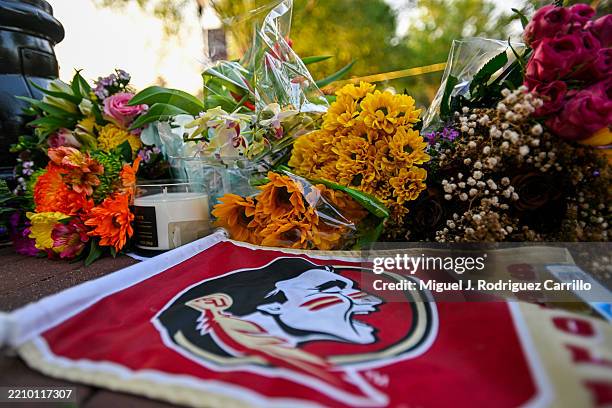 Students hold a vigil near the scene of a shooting near the Florida State University student center on April 17, 2025 in Tallahassee, Florida....