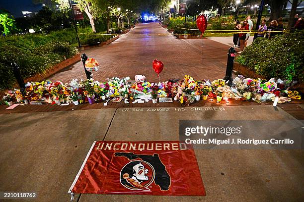 Students hold a vigil near the scene of a shooting near the Florida State University student center on April 17, 2025 in Tallahassee, Florida....