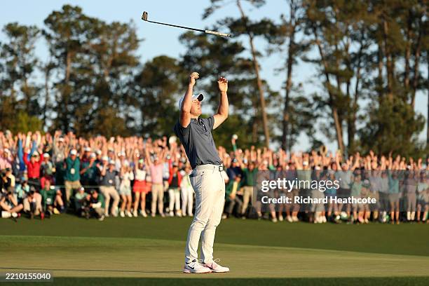 Rory McIlroy of Northern Ireland celebrates winning the 2025 Masters Tournament after the playoff hole on the 18th green during the final round of...