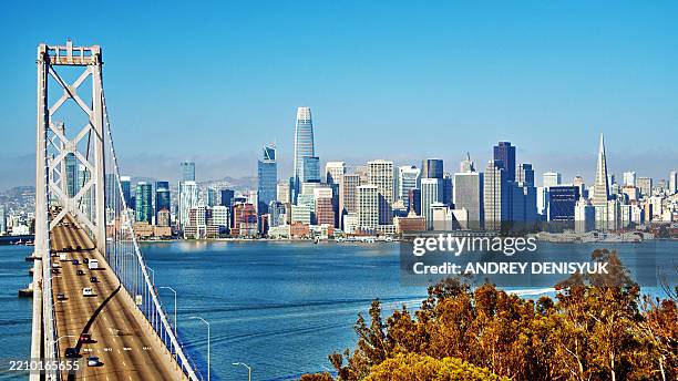 san francisco. morning. financial district skyline. bridge. - san francisco financial district stock pictures, royalty-free photos & images