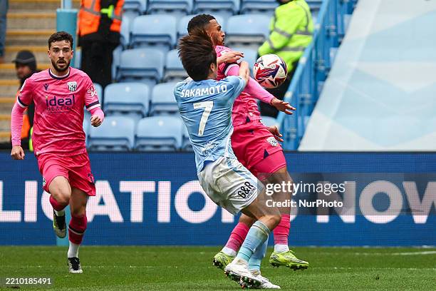 Tatsuhiro Sakamoto of Coventry City, and, Karlan Grant of WBA fight for possession during the Sky Bet Championship match between Coventry City and...