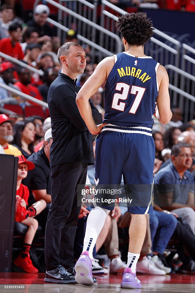 Denver Nuggets Interim Head Coach David Adelman speaks with Jamal ...