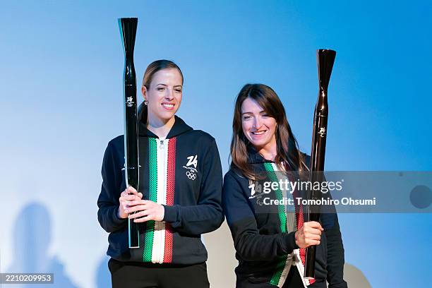 Former figure skater Carolina Kostner and para athlete Martina Caironi unveil the Milano Cortina Olympic and Paralympic torches at the Expo 2025...