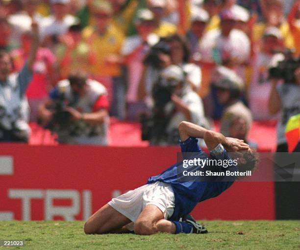 FRANCO BARESI OF ITALY DROPS TO HIS KNEES IN DESPAIR AFTER HE MISSED ITALY'S FIRST PENALTY DURING THE PENALTY SHOOTOUT IN THE 1994 WORLD CUP FINAL AT...