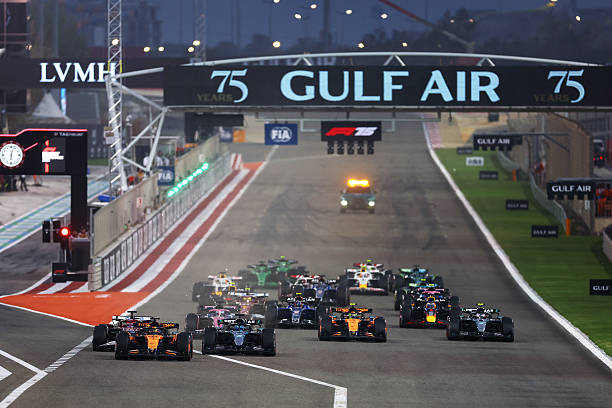 Oscar Piastri of Australia driving the McLaren MCL39 Mercedes leads George Russell of Great Britain driving the Mercedes AMG Petronas F1 Team W16...