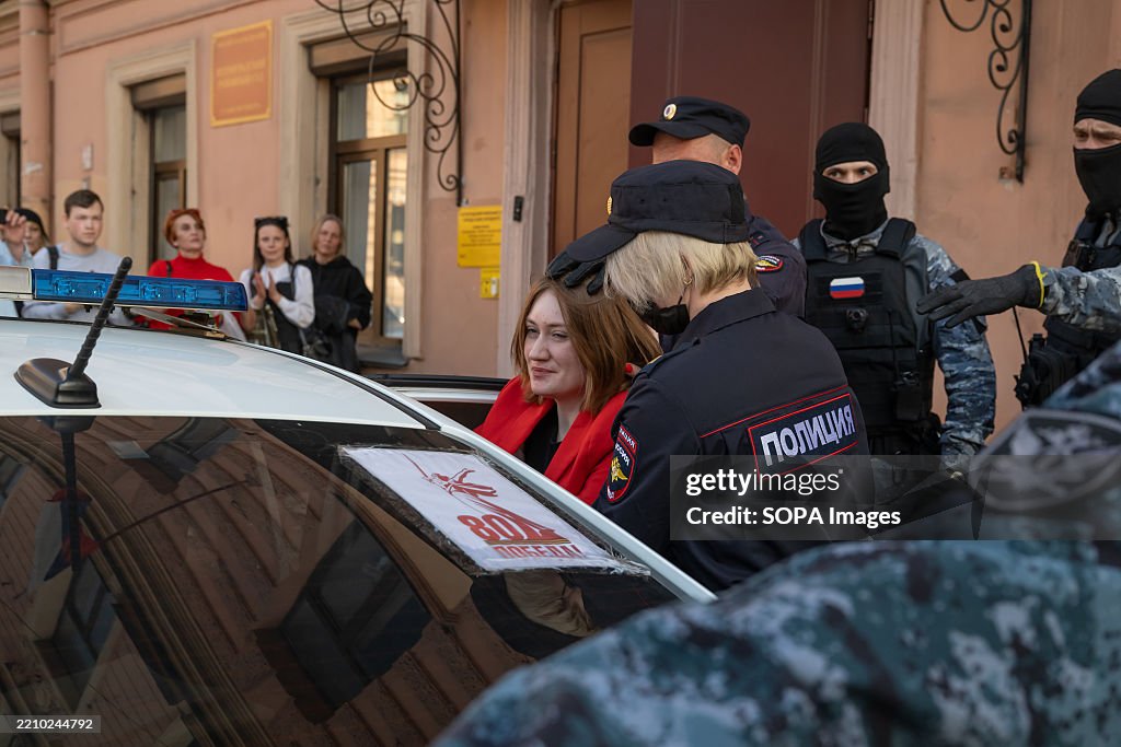 Activist Darya Kozyreva, accused of discrediting the army,...