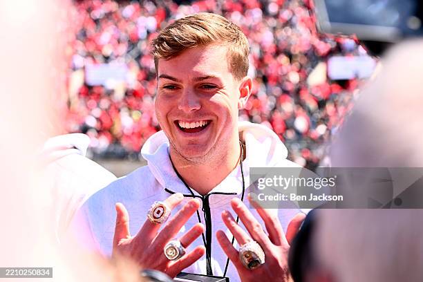 Former Ohio State quarterback Will Howard poses with his 2025 National Championship rings during the Ohio State Spring Game at Ohio Stadium on April...
