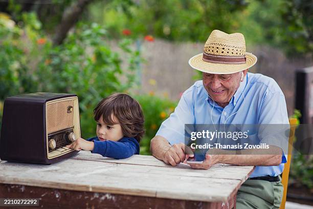 820 Child Listening To Radio Stock Photos, High-Res Pictures, and