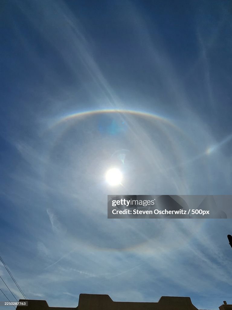 Doouble sundog in bright blue daytime sky