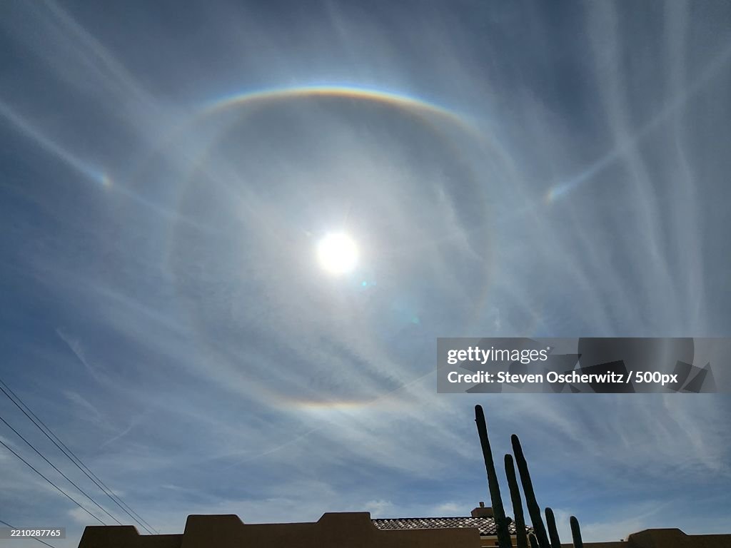Doouble sundog in bright blue daytime sky