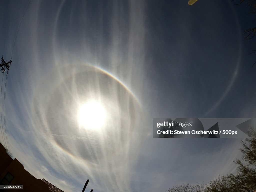 Doouble sundog in bright blue daytime sky