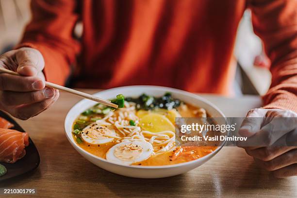 spicy ramen noodles with boiled egg close up - ramen noodles stock pictures, royalty-free photos & images