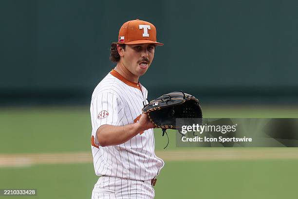 Texas pitcher Luke Harrison waits for the ball on the mound after a pitch during the SEC college baseball game between Texas Longhorns and Auburn...