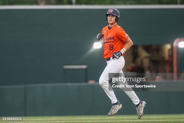 Auburn catcher Ike Irish jogs the bases after hitting a home run during the SEC college baseball game between Texas Longhorns and Auburn Tigers on...
