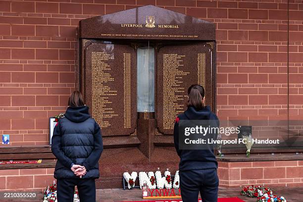 Amber Whiteley manager of Liverpool Women and Niamh Fahey of Liverpool Women laying a wreath at the Hillsborough memorial at Anfield on April 15,...