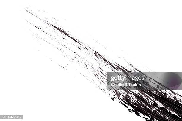 black paint isolated on white background - ink brush stock pictures, royalty-free photos & images