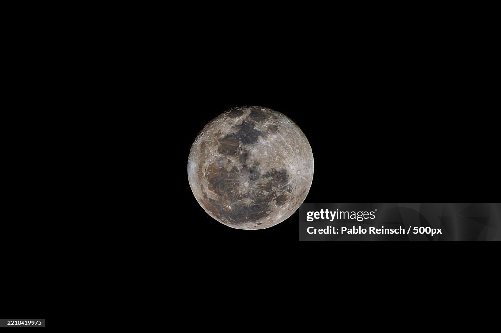 Close-up of moon against clear sky at night