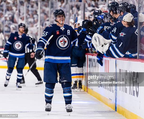 Mark Sheifele of the Winnipeg Jets celebrates his goal to make it 1-1 against the St. Louis Blues in the first period of Game One of the First Round...