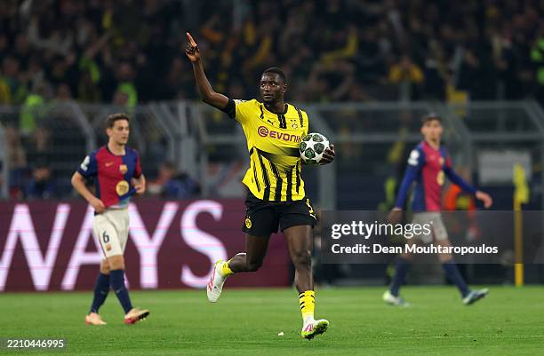 Serhou Guirassy of Borussia Dortmund celebrates scoring his team's first goal during the UEFA Champions League 2024/25 Quarter Final Second Leg match...