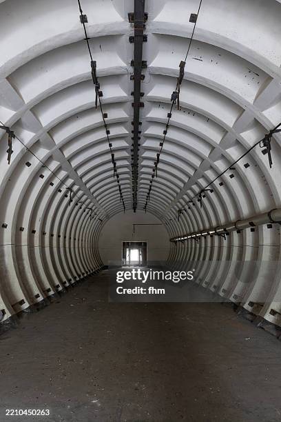 tunnel in an old military bunker - military bunker stock pictures, royalty-free photos & images