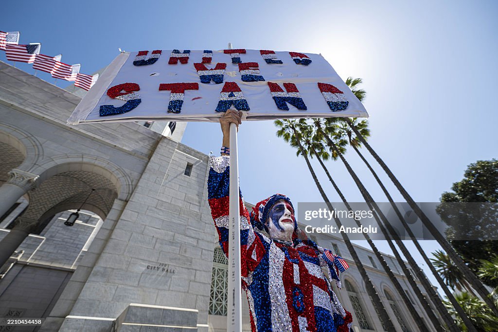 Protesters rally and march for immigrant rights in LA