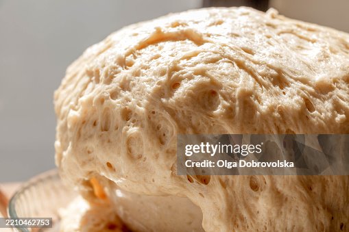 Close-up shot of the rising yeast dough Close-up shot of the rising yeast dough