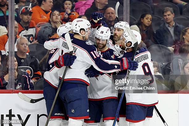 Adam Fantilli of the Columbus Blue Jackets celebrates his goal with teammates during the third period against the Philadelphia Flyers at the Wells...