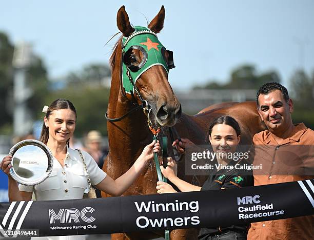 Trainer Julius Sandhu and Tian Pozman are seen after Show of Gold won Race 2 during Melbourne Racing at Caulfield Heath Racecourse on April 16, 2025...