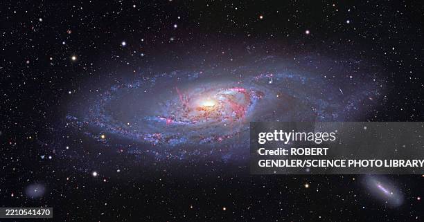 spiral galaxy m106, composite image - hubble space stock pictures, royalty-free photos & images