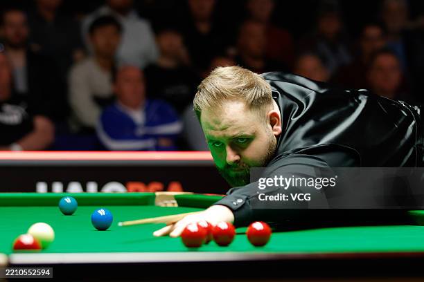 Jackson Page of Wales plays a shot in the fourth round match against Joe O'Connor of England on day 10 of World Championship Qualifiers 2025 at...