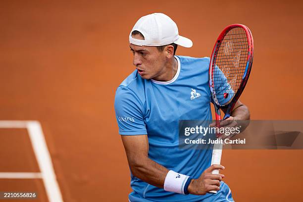 Sebastian Baez of Argentina plays against Holger Rune of Denmark during their match of day two of the Barcelona Open Banc Sabadell at Real Club De...