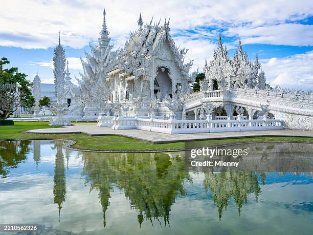 thailand chiang rai white temple wat rong khun - mlenny stock pictures, royalty-free photos & images