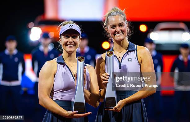 Erin Routliffe of New Zealand & Gabriela Dabrowski of Canada pose with their champions trophies after defeating Ekaterina Alexandrova and Shuai Zhang...