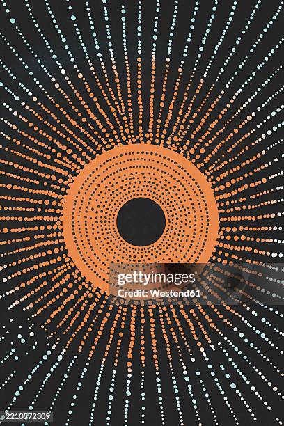 abstract circular pattern with orange and blue dots on a black background - concentric circle pattern stock illustrations