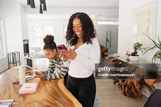 multiracial sisters doing a video for a social-media. - day in the life series stock pictures, royalty-free photos & images