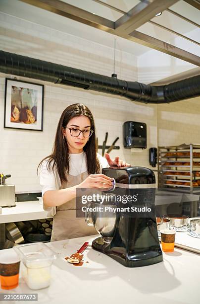 professional pastry chef teaching in a baking class - chocolate school milk stock pictures, royalty-free photos & images