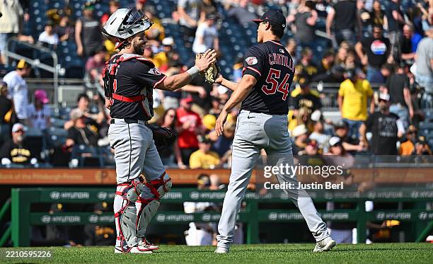 Joey Cantillo of the Cleveland Guardians celebrates with Austin Hedges after recording his first MLB save in a 5-4 win over the Pittsburgh Pirates...